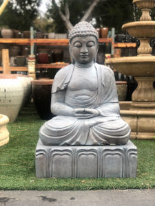 meditating statue outdoors